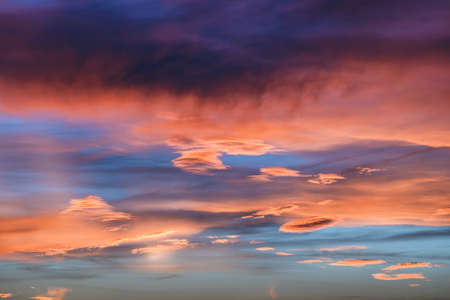 dramatic vibrant colorful clouds during sunset