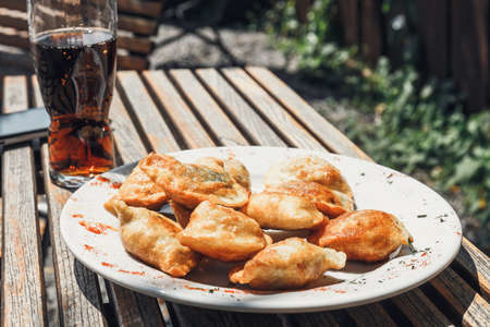 Fried dumplings on white plate, close upの写真素材