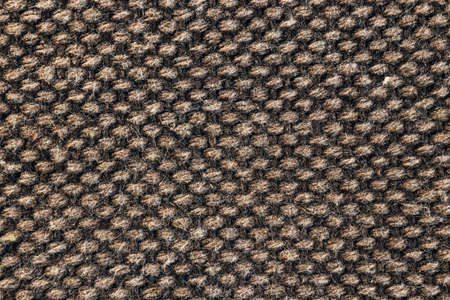 Close up of a brown tweed fabricの写真素材