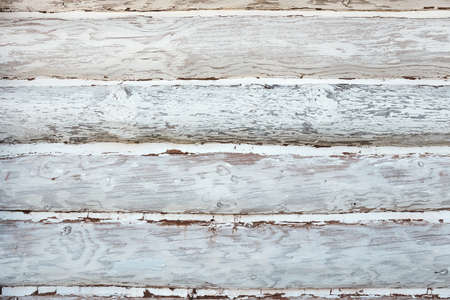 wall of the house built of bleached beams as backgroundの写真素材