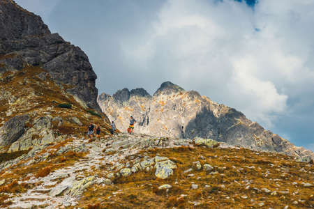 Tatra Mountains, Poland - September 10, 2017: group of people hiking in Five lakes valley in High Tatra Mountains, Polandのeditorial素材
