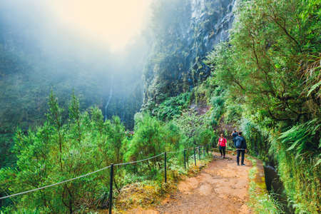 Madeira, Portugal 04 JULY, 2016: Unidentified people walking to Levada Risco, Madeira Island, Portugalのeditorial素材