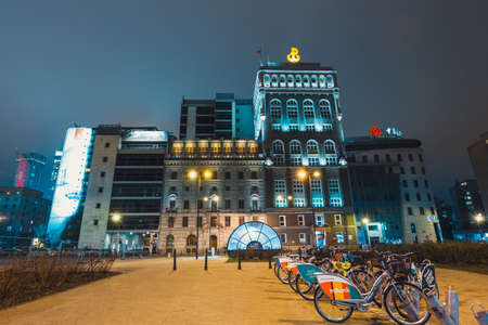 Warsaw, Poland, March 12, 2016: Night view of downtown with the PAST building and Bank of Chinaのeditorial素材
