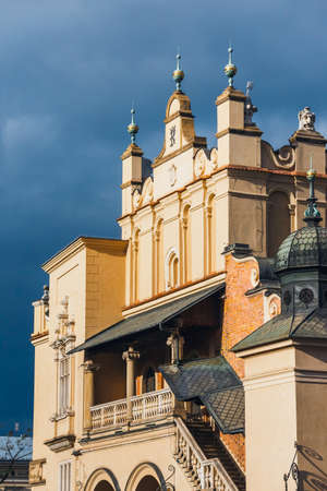 Spring day in The Main Market Square in front of the The Renaissance Sukiennice also known as The Cloth Hall, Krakowの写真素材