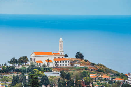 A view over the roof tops of buildings in Funchal, Madeiraの写真素材