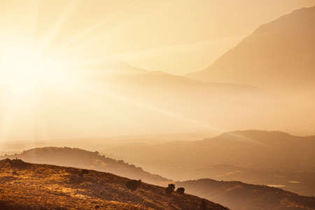 Beautiful sunset and silhouette of mountains at Crete island, Greece