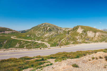 winding and dangerous road in Parang Mountains in Romaniaの写真素材