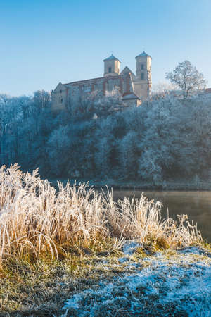Hoarfrost on the grass and the benedictine abbey in Tyniec in the background, Polandの写真素材