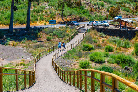 Tenerife, Spain, June 04, 2015: Unknown people visit viewpoint above the clouds in Teide National Park in Tenerife, Spainのeditorial素材