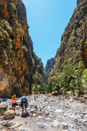Crete, Greece, May 26, 2016: Tourists hike in Samaria Gorge in central Crete, Greece. The national park is a UNESCO Biosphere Reserve since 1981のeditorial素材