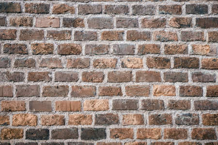 brown brick wall grunge background with copy spaceの写真素材