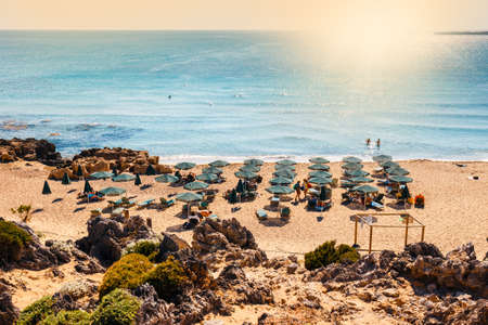 Crete Island, Greece - May 25, 2016: People relax and sunbathe on beautiful Falasarna beach on Crete Island, Greeceのeditorial素材