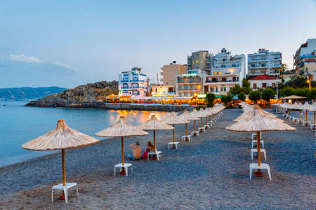 Agios Nikolaos, Crete, Greece - June 08, 2017: Landscape of Agios Nikolaos beach, Greek island of Crete. It is a popular beach in Agios Nikolaos, Greeceのeditorial素材