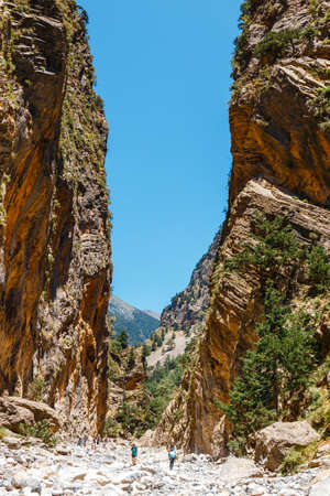Crete, Greece, May 26, 2016: Tourists hike in Samaria Gorge in central Crete, Greece. The national park is a UNESCO Biosphere Reserve since 1981のeditorial素材