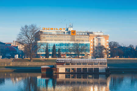 Krakow, Poland - March 09, 2015: The building of trade center Jubilat on the  Bulwar Czerwienski against Wawel Royal Castle, Krakow, Polandのeditorial素材