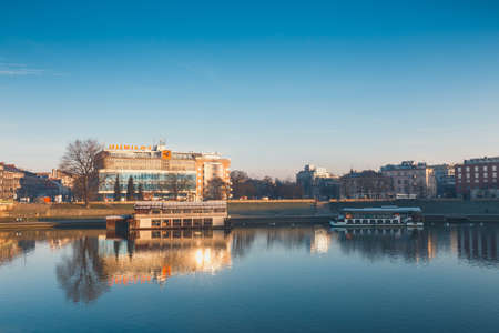 Krakow, Poland - March 09, 2015: The building of trade center Jubilat on the  Bulwar Czerwienski against Wawel Royal Castle, Krakow, Polandのeditorial素材