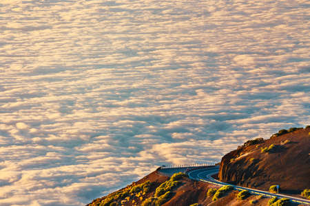 sea of clouds below the summit of Teide volcano in Tenerife, Canary island, Spainの写真素材