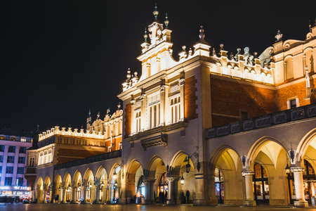 Krakow, Poland, December 15, 2017: Night view of Main Market Square and Sukiennice in Krakow. Krakow is one of the most beautiful city in Polandのeditorial素材