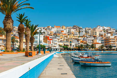 Sitia, Crete, Greece, June 11, 2917: Seaport of Sitia town with moored traditional Greek fishing boatのeditorial素材