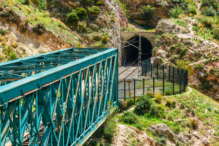 El Caminito del Rey with train iron bridge in Malaga, Spain. End of the tourist trailの写真素材