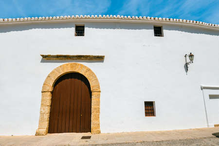 White wall of Plaza de Toros in Ronda, Spain, Andalusiaの写真素材