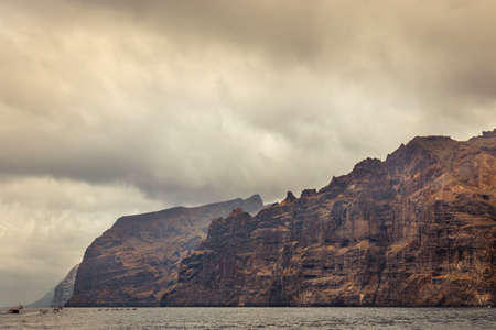 cloudy cliffs of Los Gigantes in Tenerife, Canary Islands, Spainの写真素材