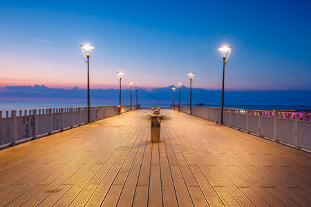 Concrete pier in Kolobrzeg, Poland. Long exposure shot at nightの写真素材