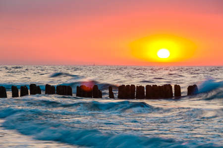 Sunset on the beach with with beautiful skyの写真素材