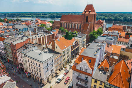 Torun, Poland - June 01, 2018: Aerial view of historical buildings and roofs in Polish medieval town...