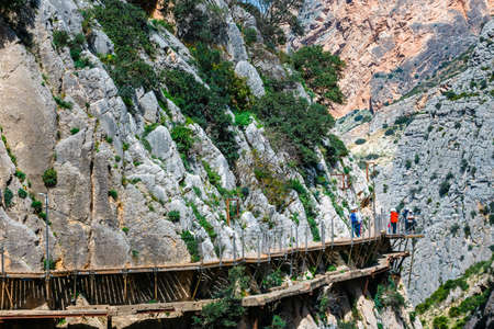 Caminito del Rey, Spain, April 04, 2018: Royal Trail also known as El Caminito Del Rey - mountain path along steep cliffs in gorge Chorro, Andalusia, Spainのeditorial素材