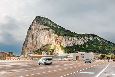 Gibraltar, Spain - April 07, 2018: runway of the airport in Gibraltar. The runway crosses road. Airport one of the most extreme airports in the worldのeditorial素材