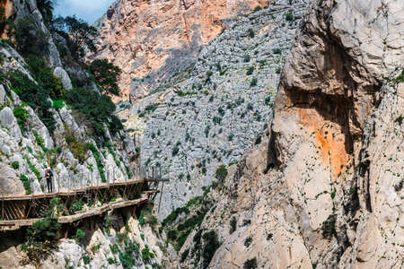Caminito Del Rey, Spain, April 04, 2018: Visitors walking along the  World's Most Dangerous Footpath reopened in May 2015. Ardales, Spain.のeditorial素材