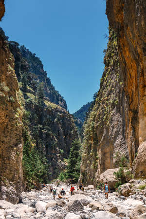 Crete, Greece, May 26, 2016: Tourists hike in Samaria Gorge in central Crete, Greece. The national park is a UNESCO Biosphere Reserve since 1981のeditorial素材