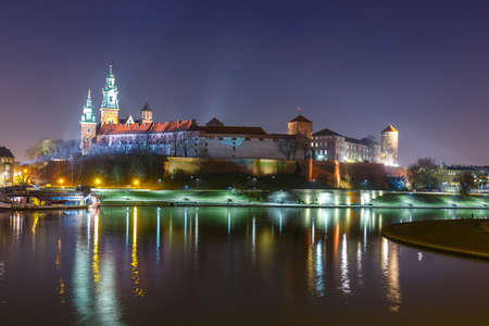 Wawel Castle in the evening in Krakow with reflection in the river, Poland. Long time exposureの写真素材