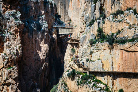 Caminito del Rey, Spain, April 04, 2018: Royal Trail also known as El Caminito Del Rey - mountain path along steep cliffs in gorge Chorro, Andalusia, Spainのeditorial素材