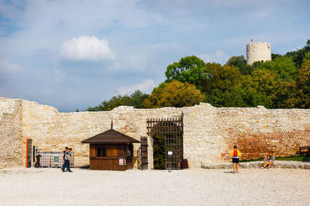 Kazimierz Dolny, Poland, August 31, 2018: Unknown people visit the ruins of the castle in Kazimierz Dolny at Vistula river in Polandのeditorial素材