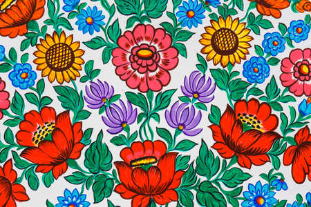Zalipie, Poland, August 19, 2018:  Close up of colorful flowers painted on wooden cottage in Zalipie, Poland. It is known for a local custom of painting the cottages with decorative motifsのeditorial素材