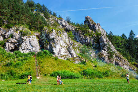 Bedkowska Valley, Poland, August 12, 2018: a group of people are walking around the Bedkowska Valley in Polandのeditorial素材