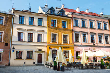 Lublin, Poland, September 01, 2018: Historic tenements and outdoor restaurants in the old town in Lublin, Poland.のeditorial素材