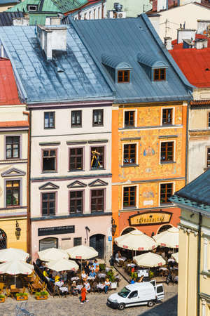 Lublin, Poland, September 01, 2018: Historic tenements and outdoor restaurants in the old town in Lublin, Poland.のeditorial素材