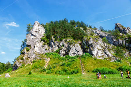 Bedkowska Valley, Poland, August 12, 2018: a group of people are walking around the Bedkowska Valley in Polandのeditorial素材