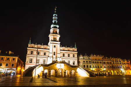 Zamosc, Poland - September 01, 2018: Great Market Square at night. Example of a Renaissance town in Central Europe, founded in 1580 by the Jan Zamoyskiのeditorial素材