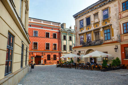 Lublin, Poland, September 01, 2018: Historic tenements and outdoor restaurants in the old town in Lublin, Poland.のeditorial素材