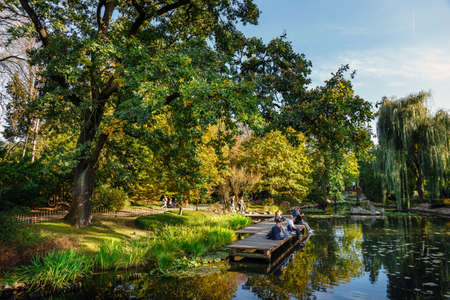 Wroclaw, Poland, October 06, 2018: group of unknown people relax in the Japanese garden in Wroclaw, Polandのeditorial素材