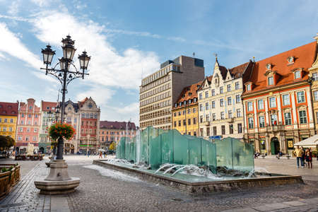 Wroclaw, Poland, October 07, 2018: Morning scene with fountain on Wroclaw Market Square, Polandのeditorial素材
