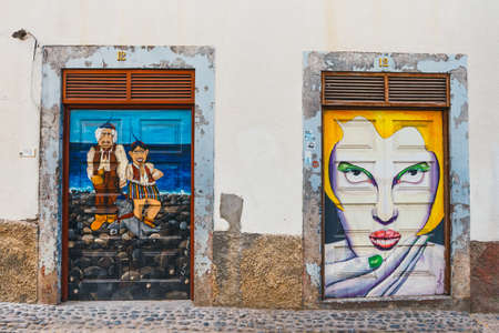 Funchal, Madeira, July 06, 2016:  Painted door and wall of a house in the street of Santa Maria, Madeiraのeditorial素材