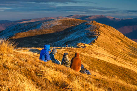 Wetlina, Poland, November 12, 2011:Group of people enjoy the sunset over Bieszczady Mountains, south east Polandのeditorial素材