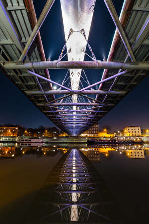 Bernatka footbridge over Vistula river at night, Krakow, Polandの写真素材