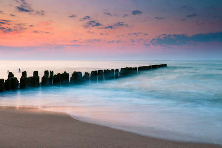 Breakwater at beautiful sunset, Baltic Sea, Polandの写真素材