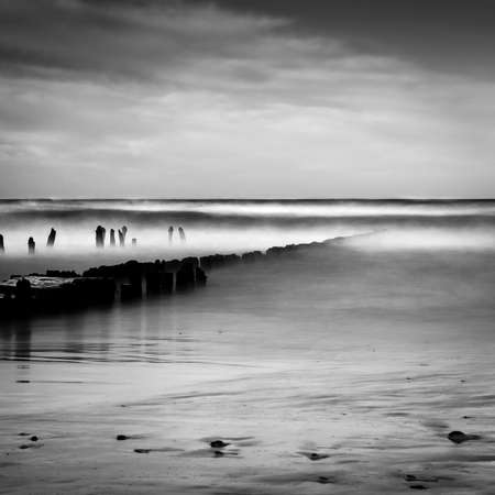 Long exposure shot of the sea and a pier, black and white photo, Baltic Sea, Polandの写真素材